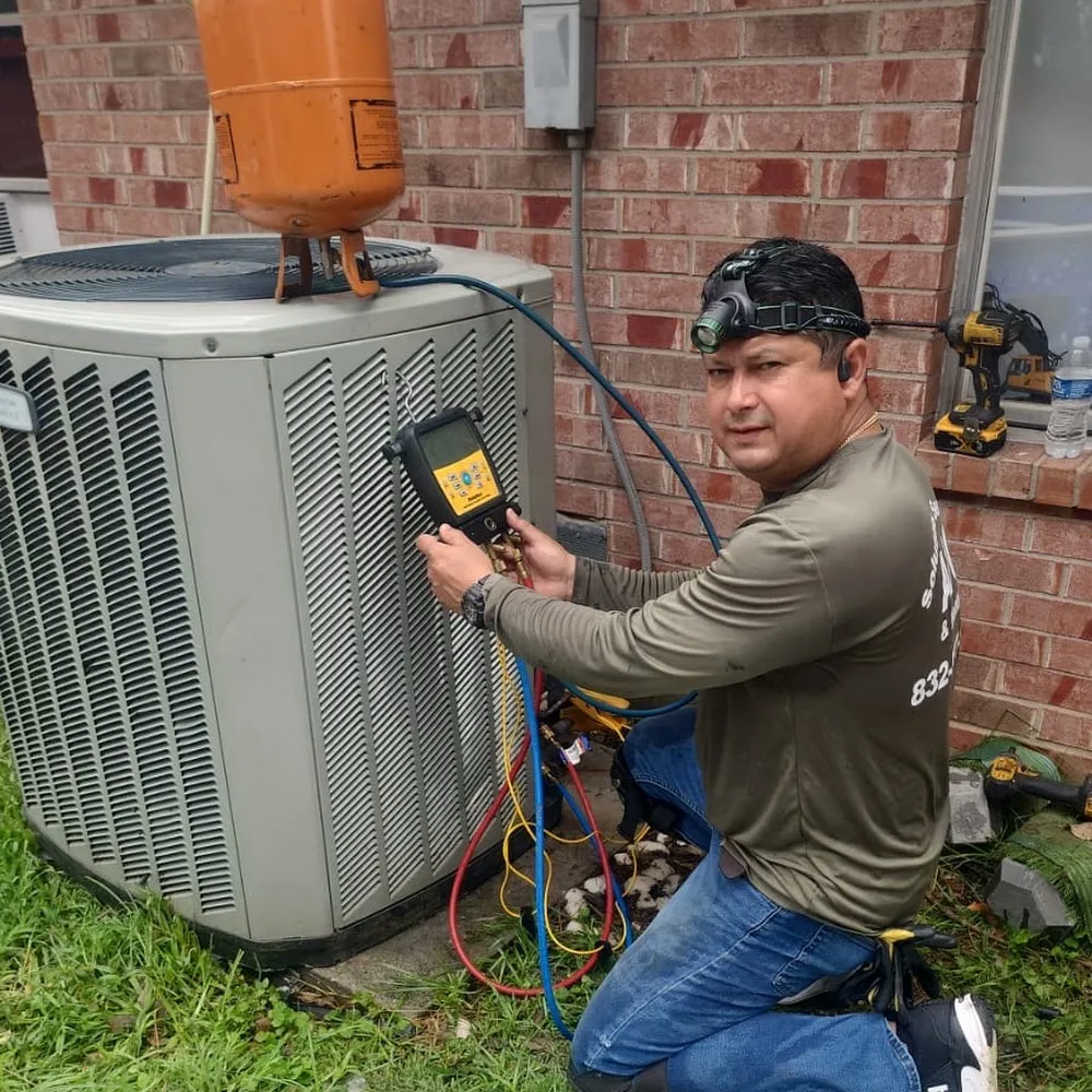 Solutions services A/C & HEATING — team or office photo
